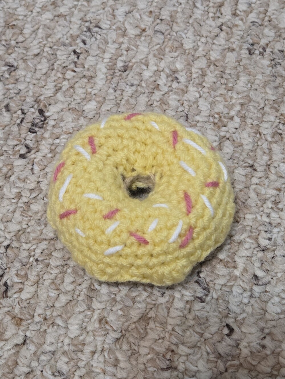 Hand Crafted Yellow Crochet Donut Toy with Pink & White Sprinkles